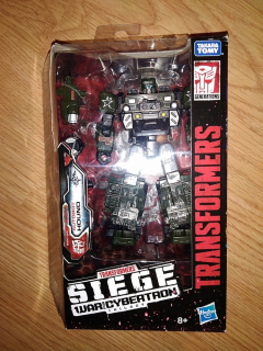 TRANSFORMERS - Transformátory WFC Siege Autobot Hound