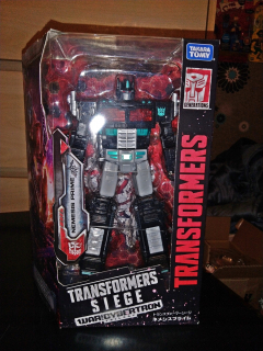 TRANSFORMERS - Transformátory WFC Siege Nemesis Prime